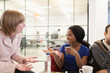 © Sam Edwards/Caia Image - Businesswomen talking in office meeting
