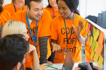 Hackers coding for charity at hackathon
