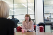 © Sam Edwards/Caia Image - Businesswomen talking in conference room meeting