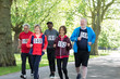 © Robert Daly/Caia Image - Active seniors power walking sports race in park