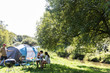 © Sam Edwards/Caia Image - Family at sunny campsite
