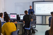 © Chris Ryan/Caia Image - Junior high teacher leading lesson
