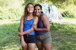 © Sam Edwards/Caia Image - Portrait happy, affectionate mother and daughter at campsite