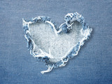 Fototapeta Dziecięca - Heart shape ripped jean denim texture