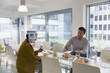 © Tom Merton/Caia Image - Business people eating sushi lunch in conference room