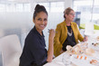 © Tom Merton/Caia Image - Portrait smiling, confident businesswoman enjoying sushi lunch