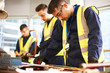 © Himalayan Pics/Caia Image - Focused male students in shop class workshop