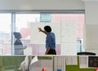 © Tom Merton/Caia Image - Business people brainstorming in office