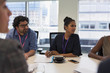 © Tom Merton/Caia Image - Attentive businesswoman listening in conference room meeting