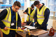 © Himalayan Pics/Caia Image - Male students using equipment in shop class workshop
