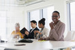© Tom Merton/Caia Image - Portrait smiling businesswoman in conference room meeting