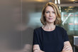 © Martin Barraud/Caia Image - Portrait senior businesswoman with arms crossed