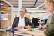 © Ryan Lees/Caia Image - Businesswomen listening in conference room