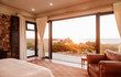 © Martin Barraud/Caia Image - Home showcase bedroom open to ocean view