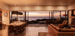 © Martin Barraud/Caia Image - Home showcase interior overlooking ocean at sunset