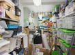 © Tom Merton/Caia Image - Messy office storage closet