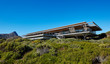© Chris Ryan/Caia Image - Modern luxury home showcase exterior under sunny blue sky