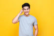 © Atstock Productions - Smart handsome young Asian man thinking with finger on head