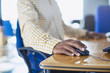© Ryan Lees/Caia Image - Businessman using computer mouse at desk
