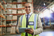 © Ryan Lees/Caia Image - Portrait confident manager with digital tablet in distribution warehouse