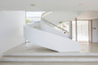 © Martin Barraud/Caia Image - White spiral staircase in modern luxury home showcase interior