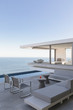 © Tom Merton/Caia Image - Modern, luxury home showcase exterior patio with ocean view