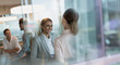 © Tom Merton/Caia Image - Smiling businesswomen talking in office