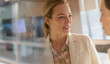 © Tom Merton/Caia Image - Smiling businesswoman talking to colleague