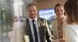 © Tom Merton/Caia Image - Portrait smiling businessman with businesswomen in office