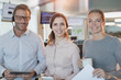 © Tom Merton/Caia Image - Portrait smiling, confident business people with digital tablet and coffee in office