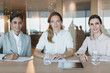 © Tom Merton/Caia Image - Portrait smiling, confident businesswomen working in conference room meeting