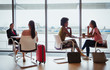 © Robert Daly/Caia Image - Businesswomen talking in airport business lounge