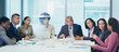 © Robert Daly/Caia Image - Business people talking in conference room meeting