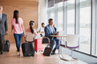 © Robert Daly/Caia Image - Businessman working in airport business lounge