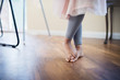 © Sam Edwards/Caia Image - Low section cute barefoot girl in tutu and leggings