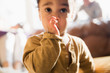 © Sam Edwards/Caia Image - Close up innocent baby boy sucking thumb