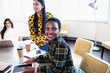 © Sam Edwards/Caia Image - Portrait smiling, confident businesswoman in conference room meeting