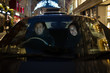 © Tom Merton/Caia Image - Smiling couple driving car at night