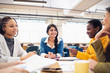 © Sam Edwards/Caia Image - Businesswomen talking in meeting