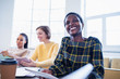 © Sam Edwards/Caia Image - Happy, confident businesswoman in conference room meeting