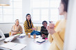 © Sam Edwards/Caia Image - Businesswomen brainstorming in conference room meeting