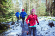 © Robert Daly/Caia Image - Family jogging in snowy woods