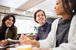 © Sam Edwards/Caia Image - Businesswomen talking in conference room meeting