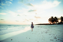 Carefree Woman In Sun Dress On Tropical Ocean Beach Mexico