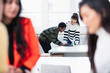 © Sam Edwards/Caia Image - Businesswomen working in new office