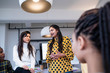 © Sam Edwards/Caia Image - Businesswomen talking in conference room meeting