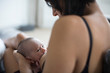 © Sam Edwards/Caia Image - Mother breastfeeding newborn baby son