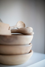 Stacked Wooden Bowls And Spoons