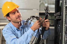 Network Engineer Preparing Cabling