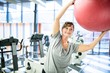 © Science RF - Senior woman exercising with fitness ball